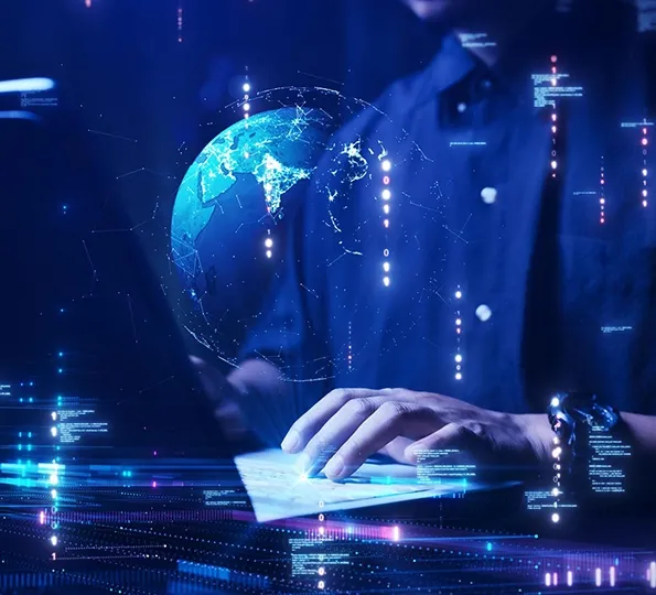 A Man On A Laptop With An AI Globe